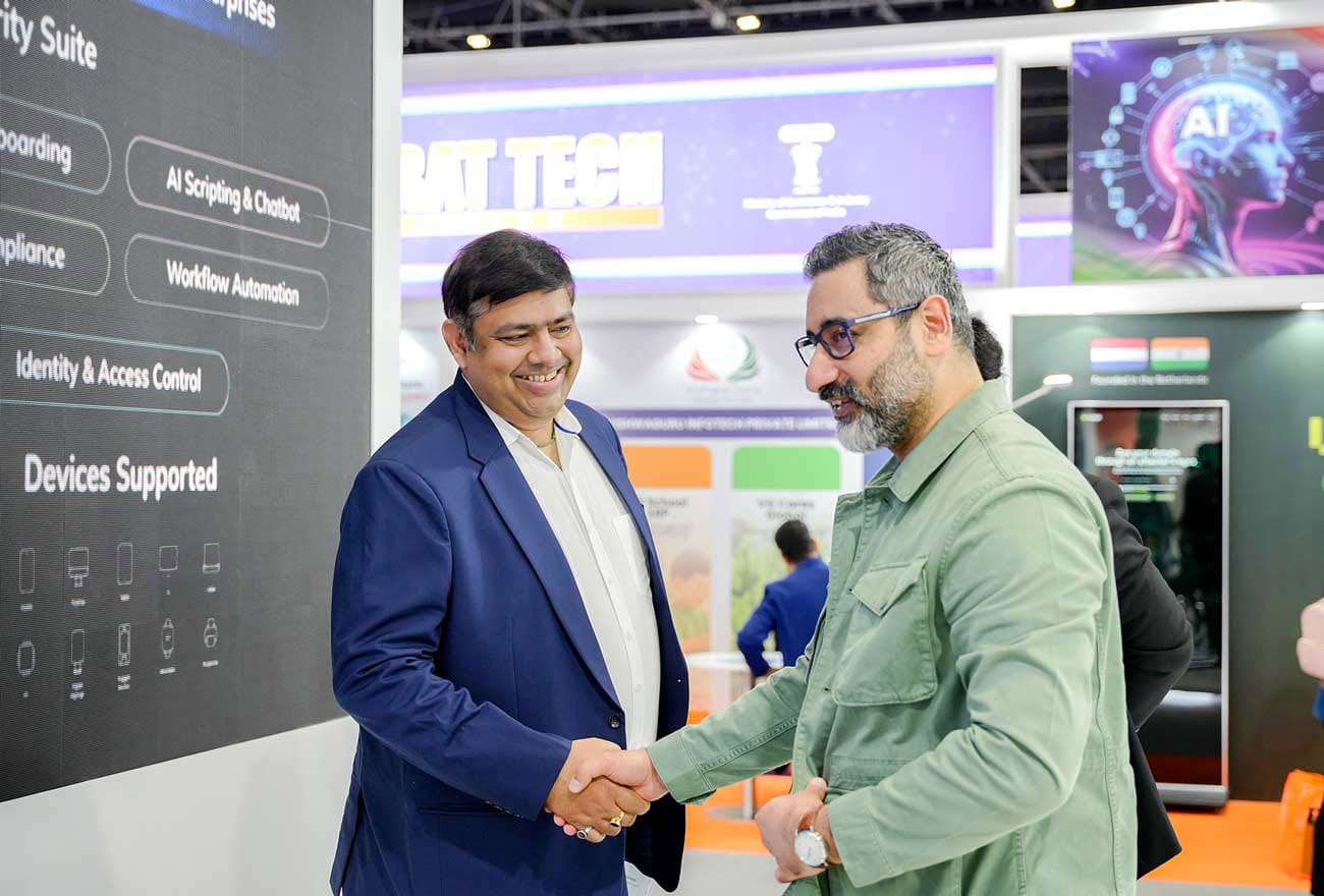 Hexnode's sales executive interacting with attendees at GITEX 2025