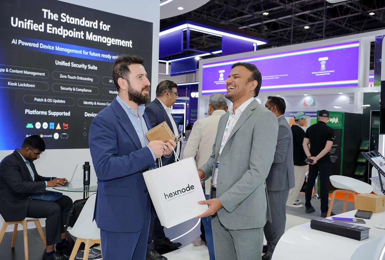 Our team handing over Hexnode's swag to attendees at GITEX 2025