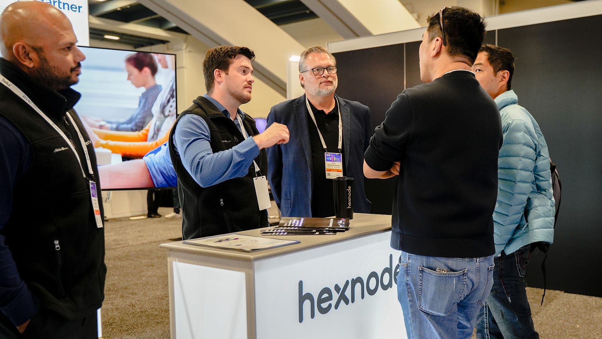 Hexnode sales executive with a customer at RSAC2025