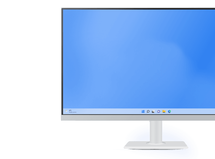 Close-up of a monitor displaying a Windows desktop with a bright blue background.