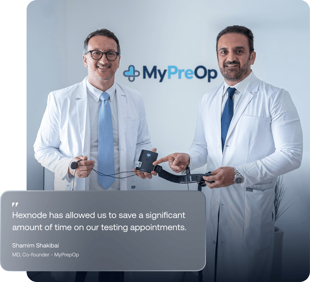 Doctors using a connected medical device in a clinic, managed with Hexnode UEM for healthcare.