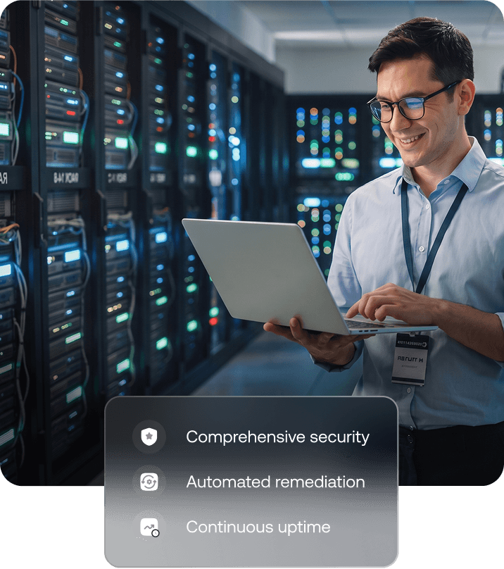 IT professional using a laptop in a data center, displayed next to the Hexnode server management console.