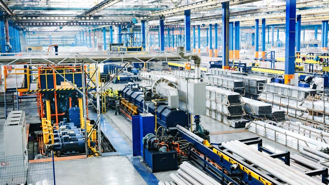 Automated machinery on a large manufacturing plant floor requiring strict industrial device security.