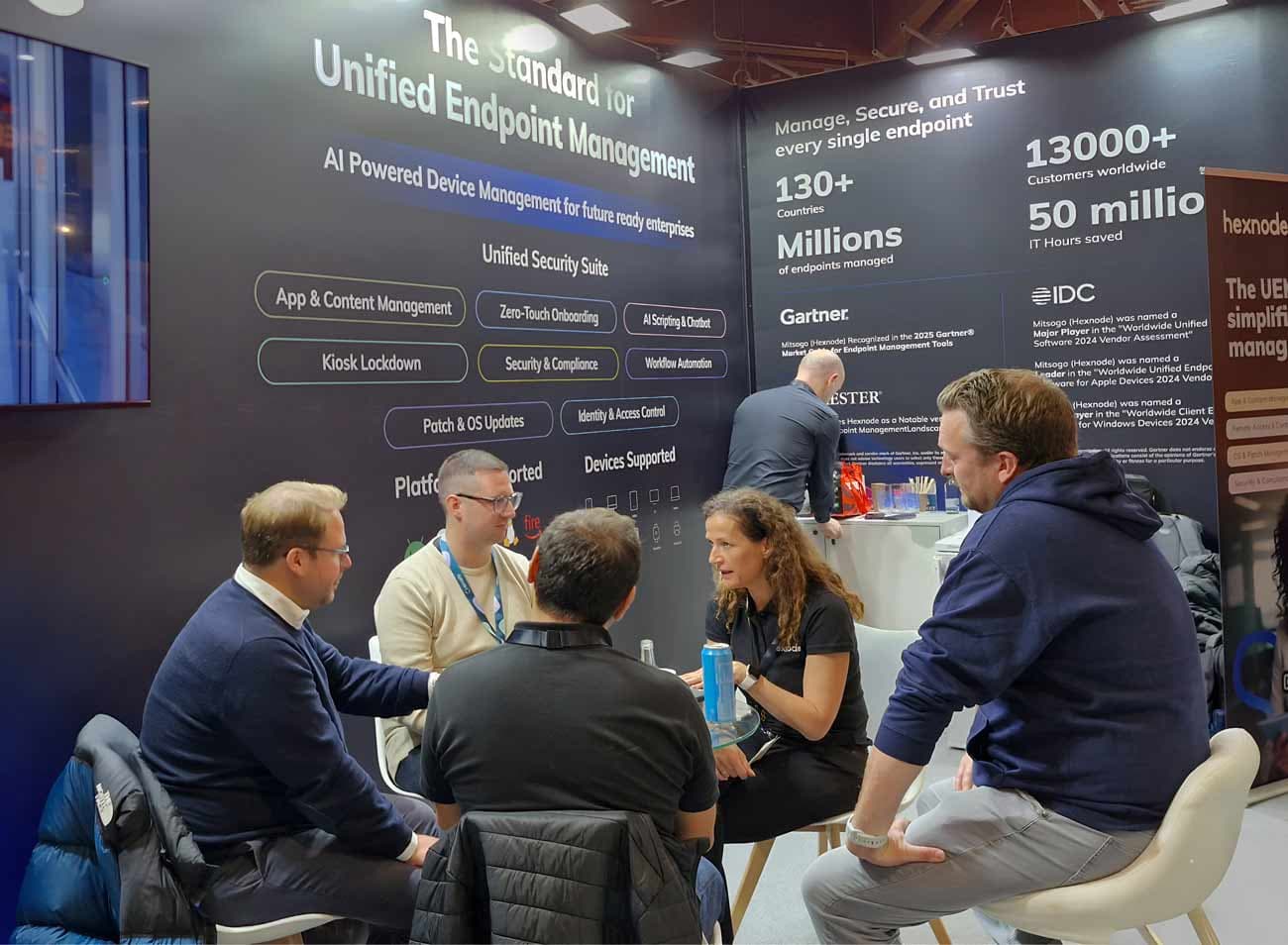 Hexnode's sales executive interacting with attendees at it-sa 2025