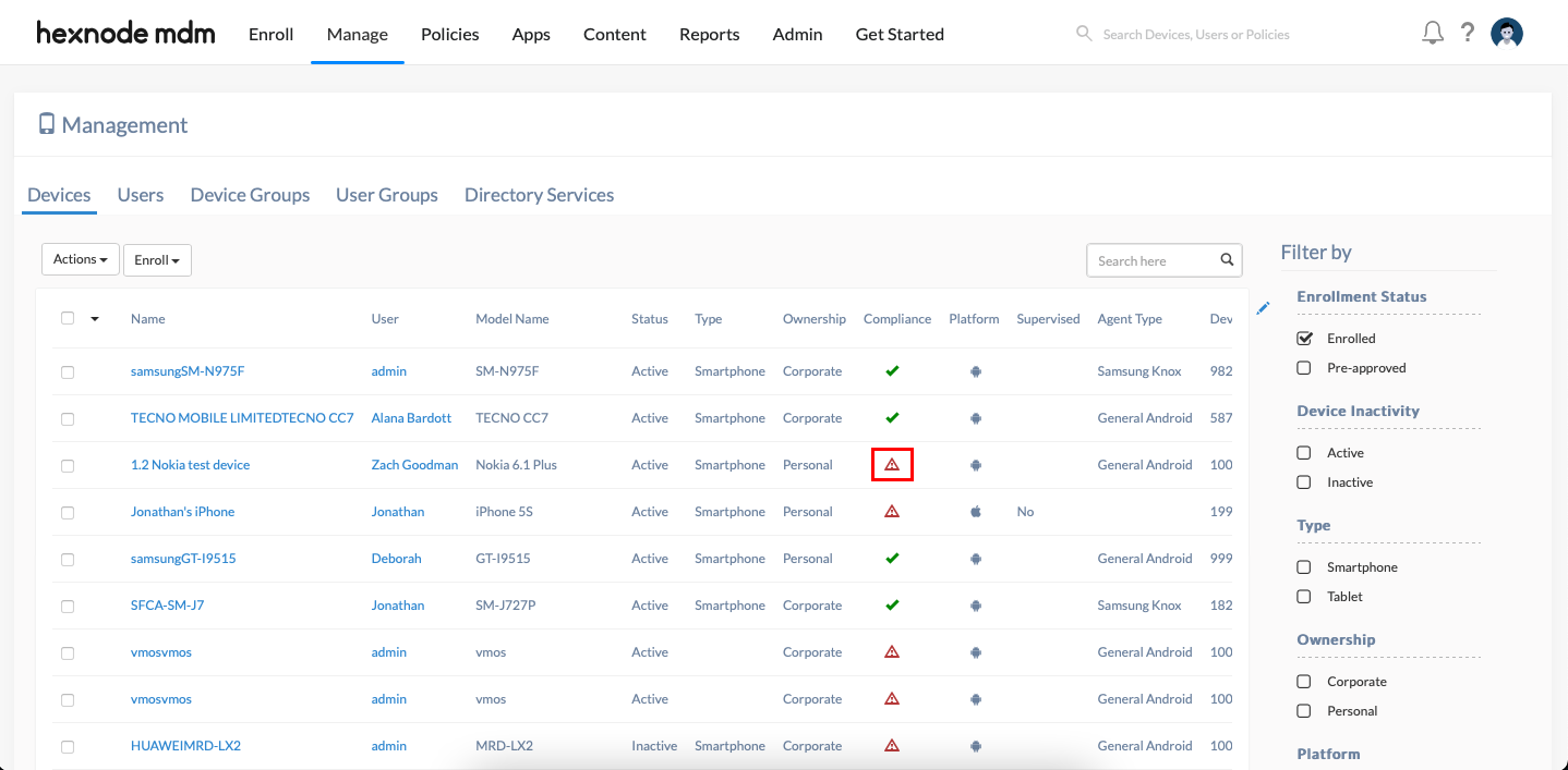 Warning icon shows for non-compliant devices on the device list under the Manage tab.